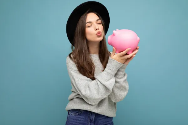 Happy GIrl with Piggy Bank