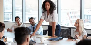 Office meeting depicting Group Insurance Plan