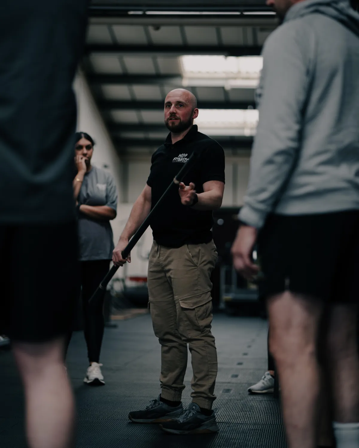 Coach leading OnRamp strength training session Aldridge