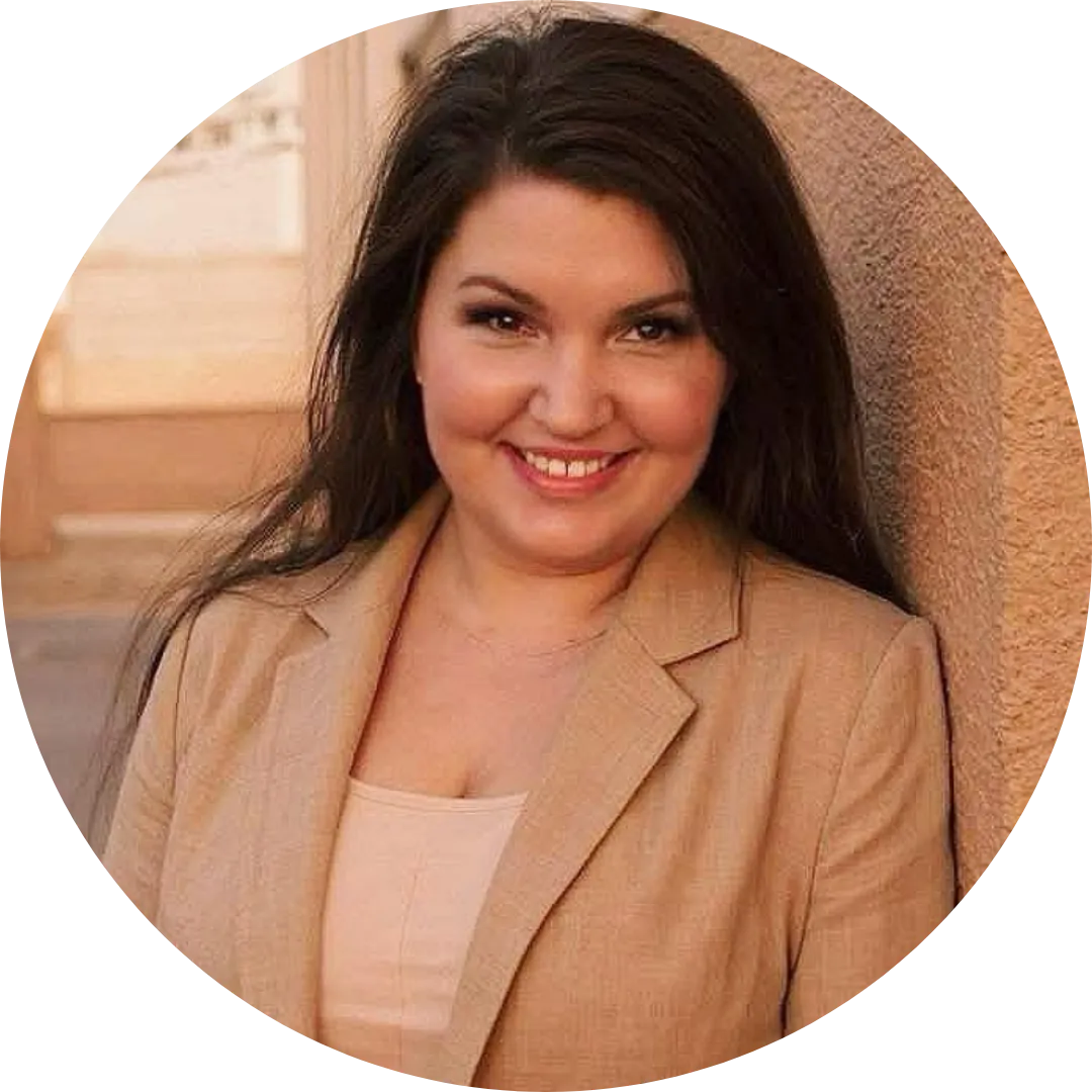 Podcast host, South Asian woman, long hair, lavender top, smiling, white background