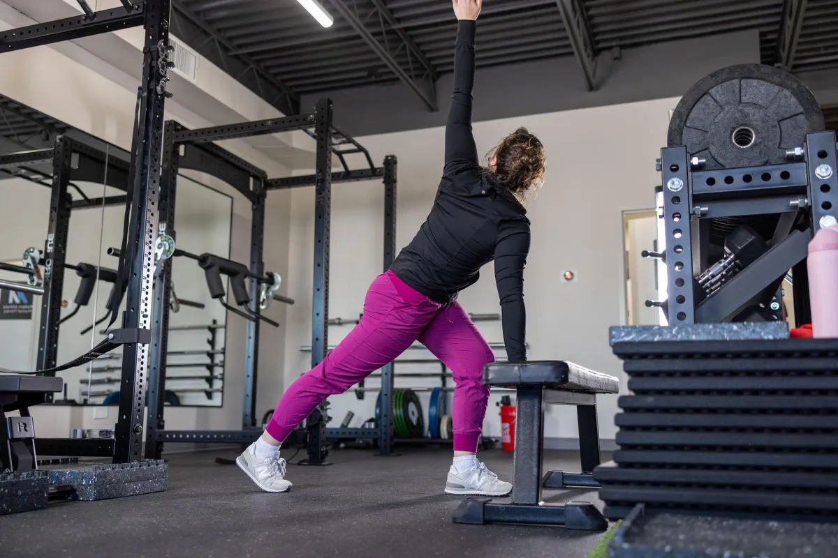 Gym photo of someone stretching