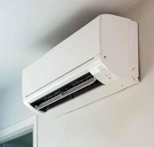 Wall-mounted mini split AC unit being installed in Lumberton, MS home
