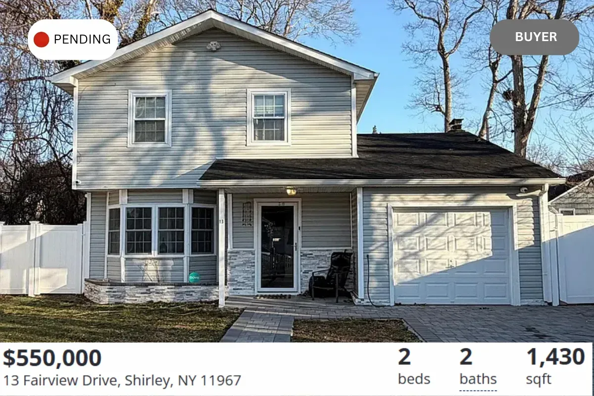 Exterior view of home for sale at 13 Fairview Drive in Shirley, New York