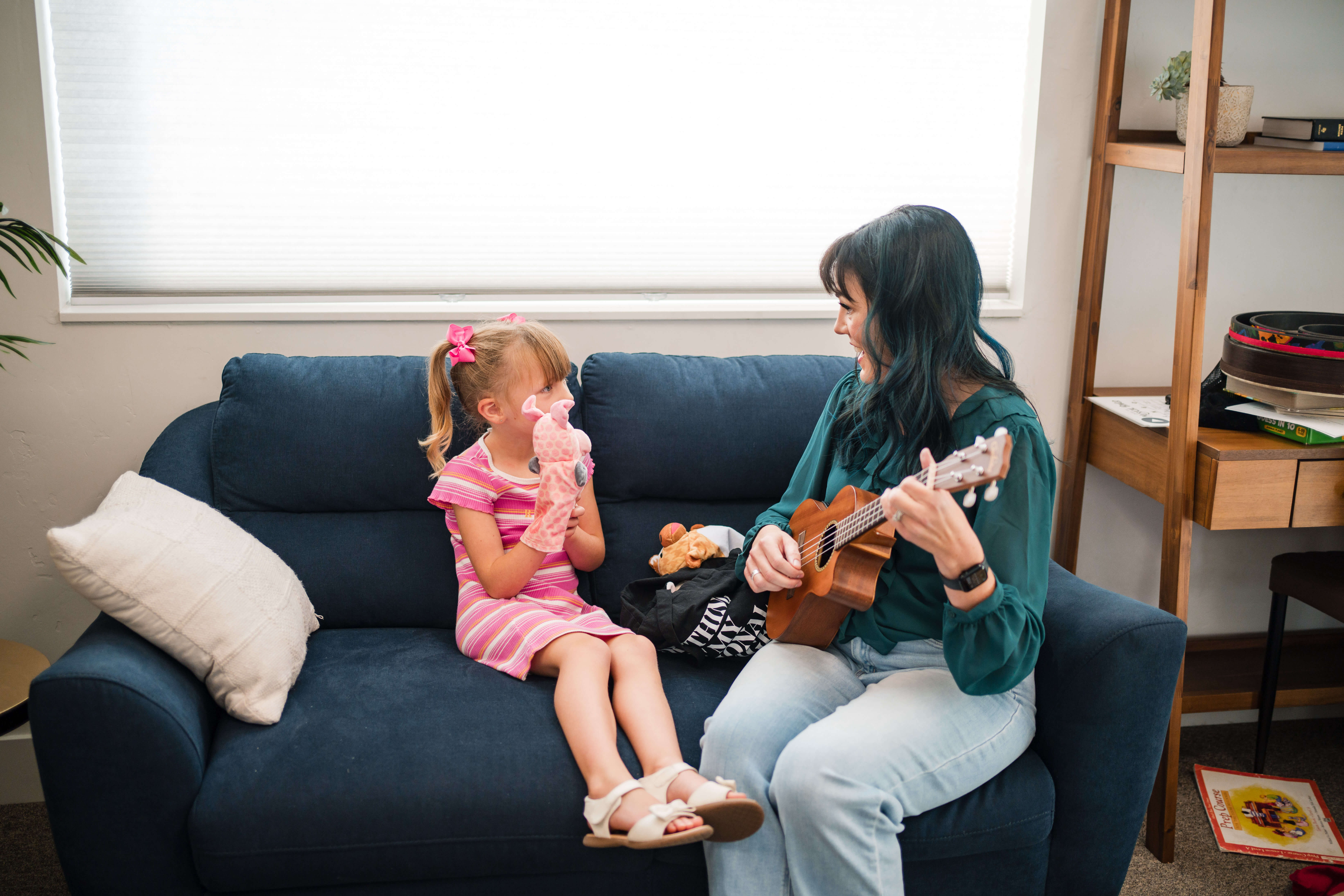 Image of two children playing music