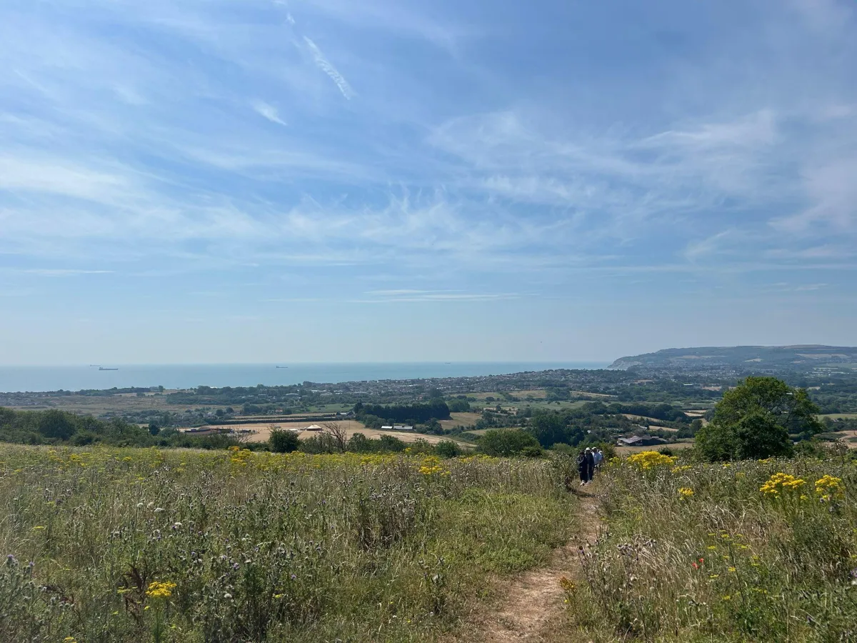 Walkers on a chalk path above the Solent, Isle of Wight