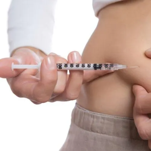 A person getting Tirzepatide weight loss injections 