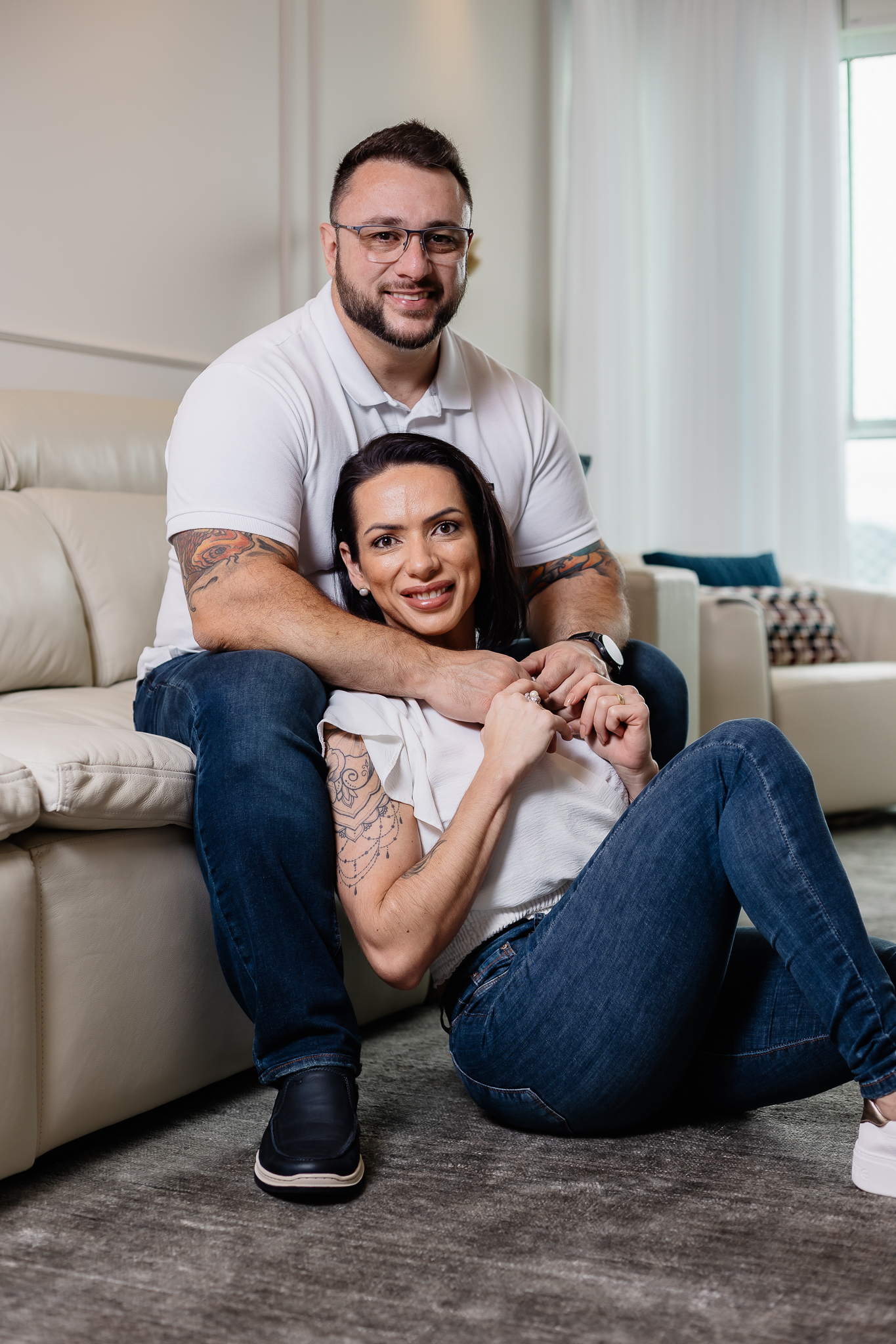 a person standing in front of a fence with a drawing on it