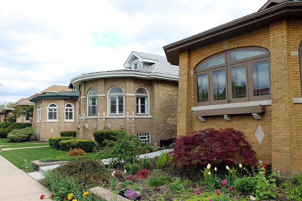 man and woman sitting on table