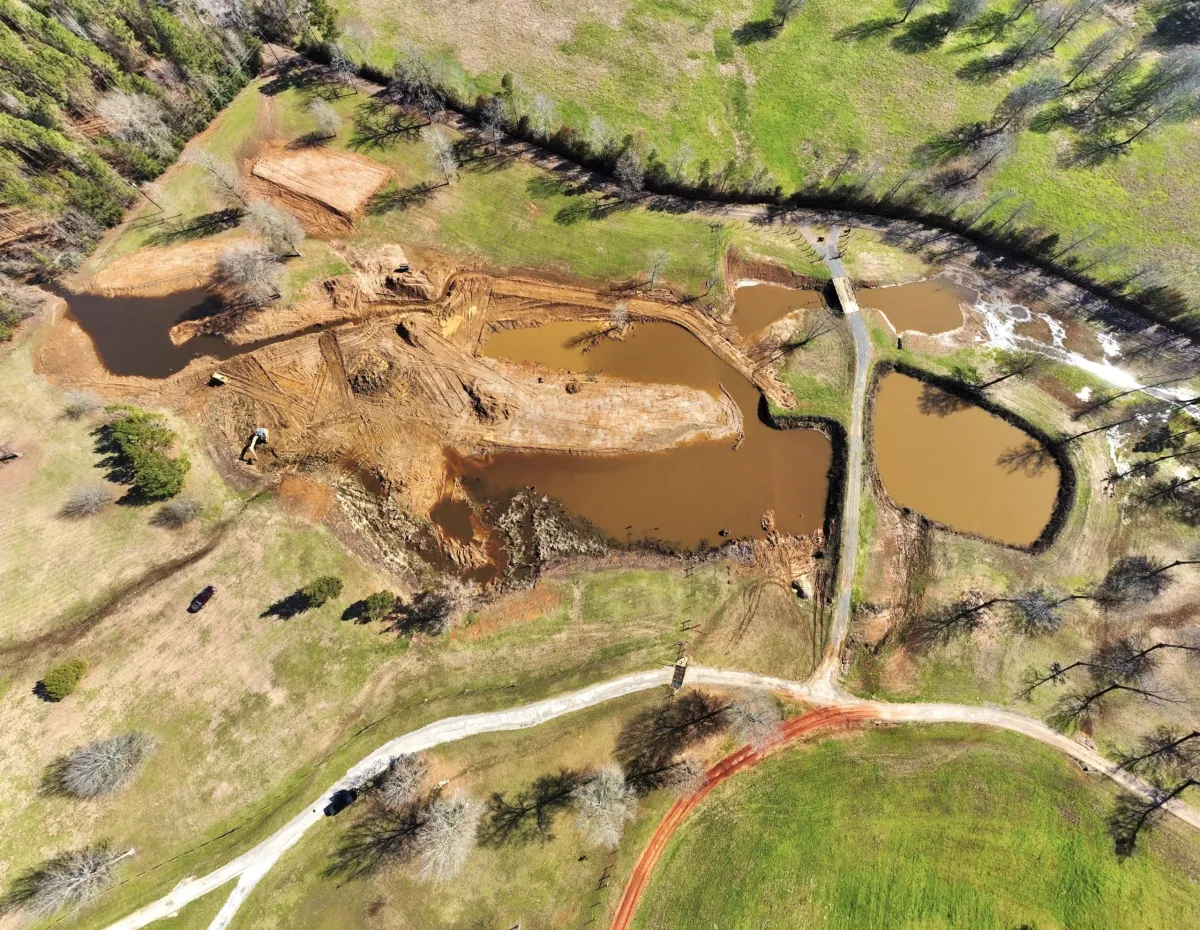 An overhead photo of a pond construction in progress.