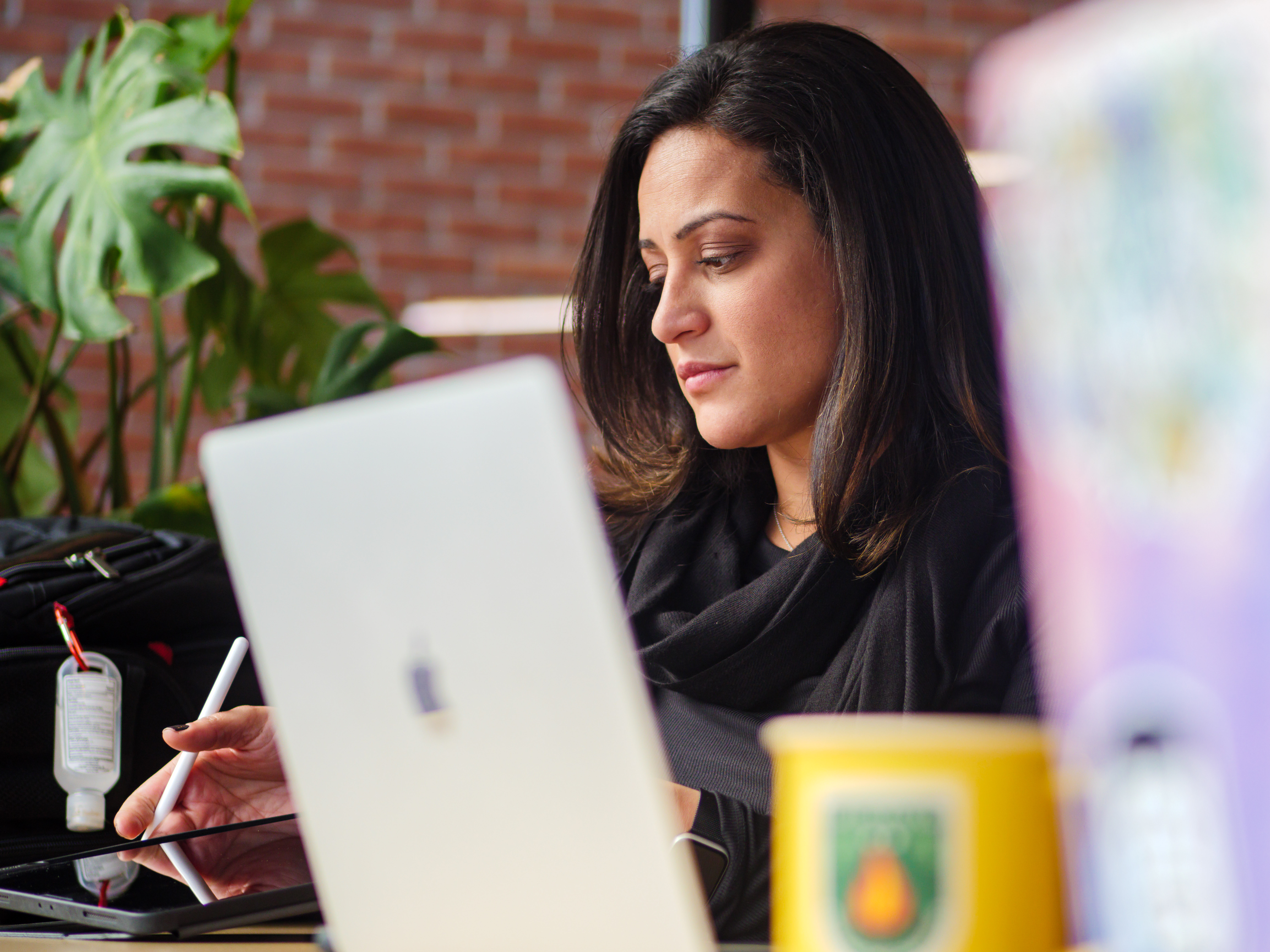Nikki from Detourin with a calm, nature-inspired backdrop