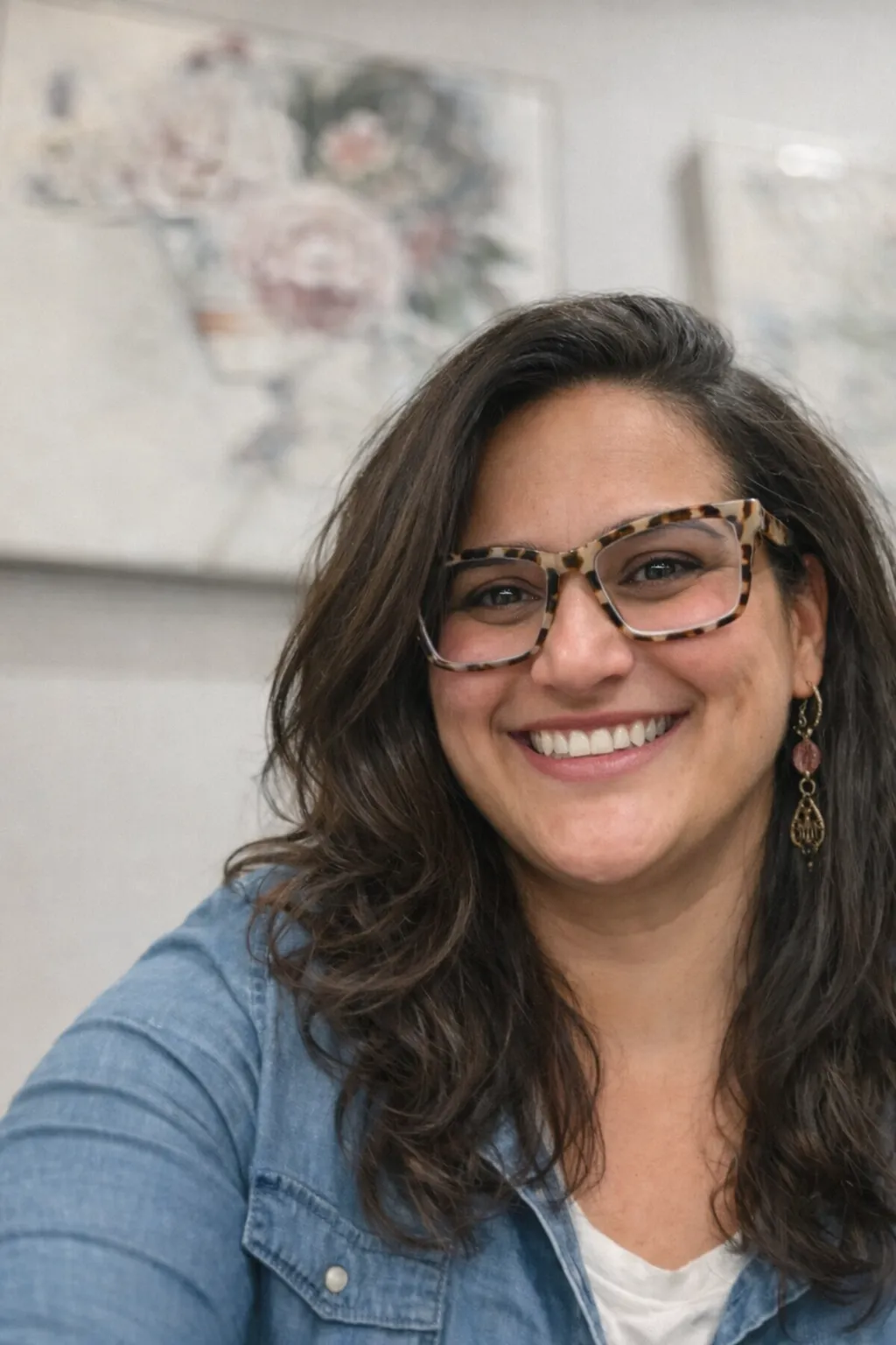 Nikki from Detourin, smiling in a calm, nature-inspired setting