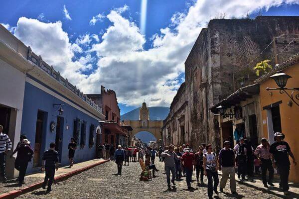 The famous yellow arch in downtown Antigua, a must-see place when traveling to Guatemala