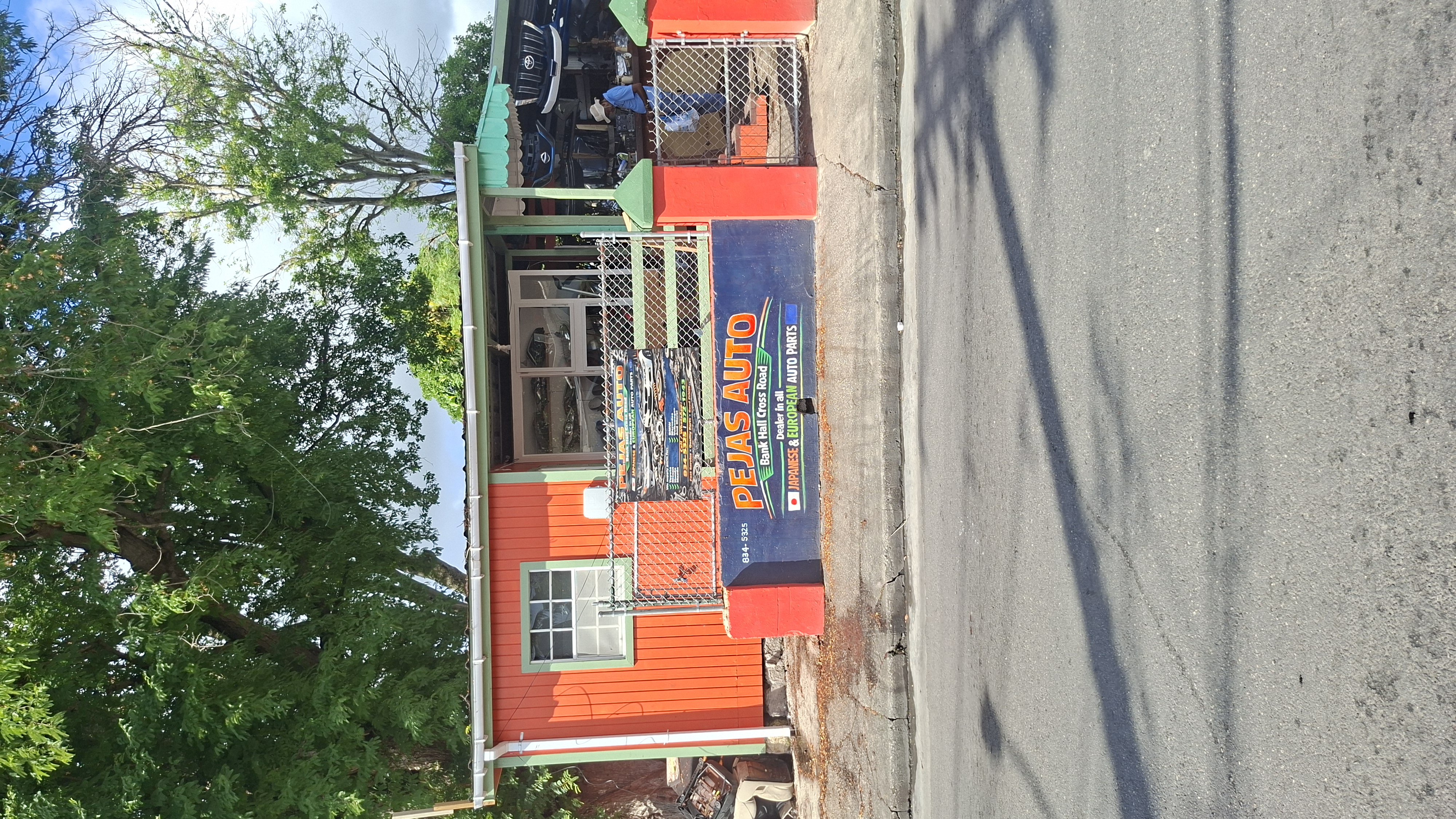 Exterior view of Pejas Auto service center and auto parts facility at Bank Hall Cross Road, St. Michael, Barbados