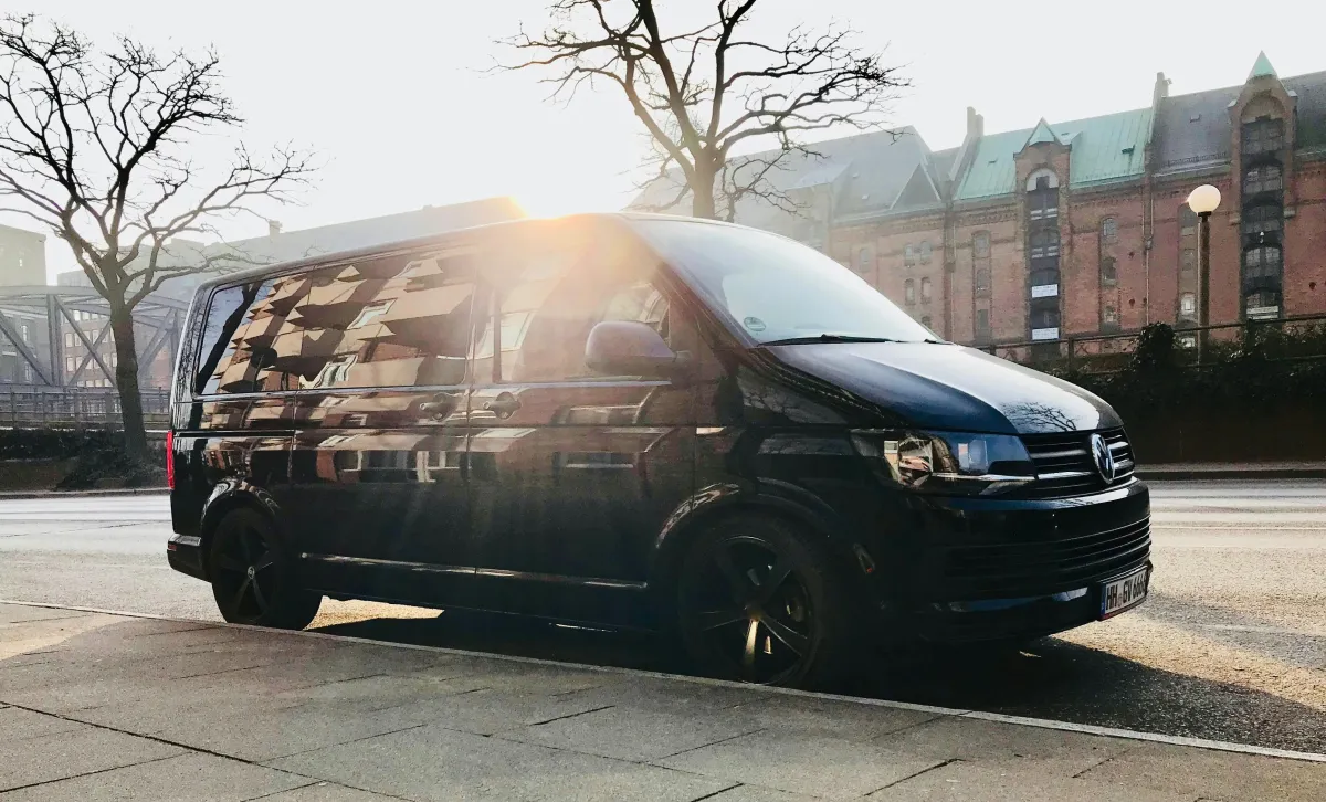 Electric delivery van representing Amazon AI-managed charging and total cost of ownership in 2026
