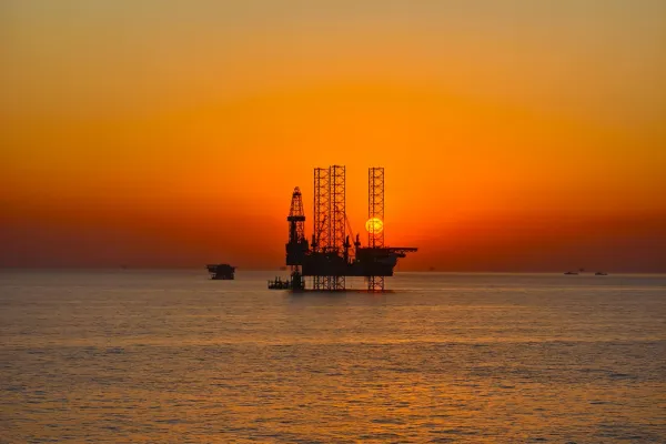 Oil rig at sunset