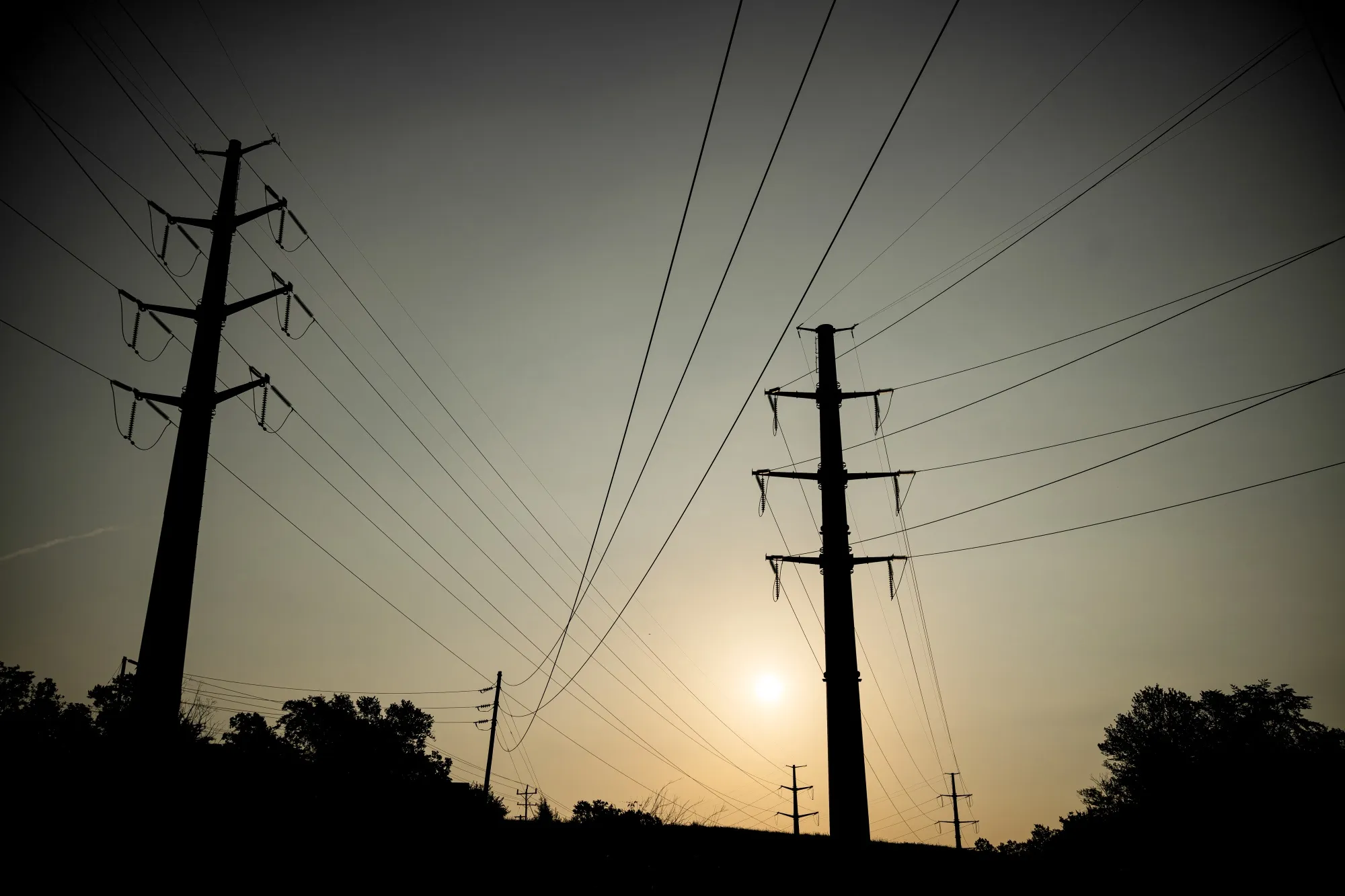 Power demand on the largest US grid surged to a record on Thursday as temperatures soared above 100F (38C) across much of the mid-Atlantic, underscoring the strain on an electricity system already struggling to cope with a data-center boom. Photographer: Graeme Sloan/Bloomberg