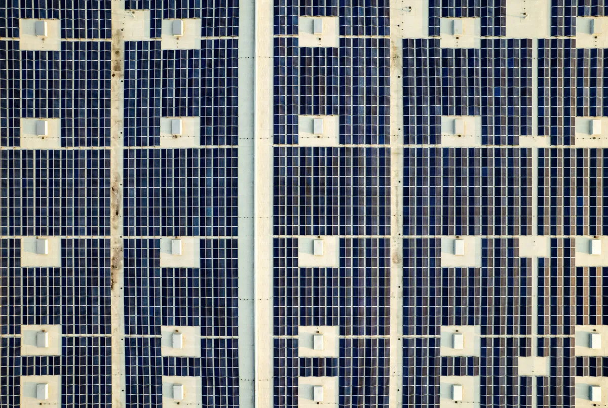 A large distribution center roof covered in solar panels