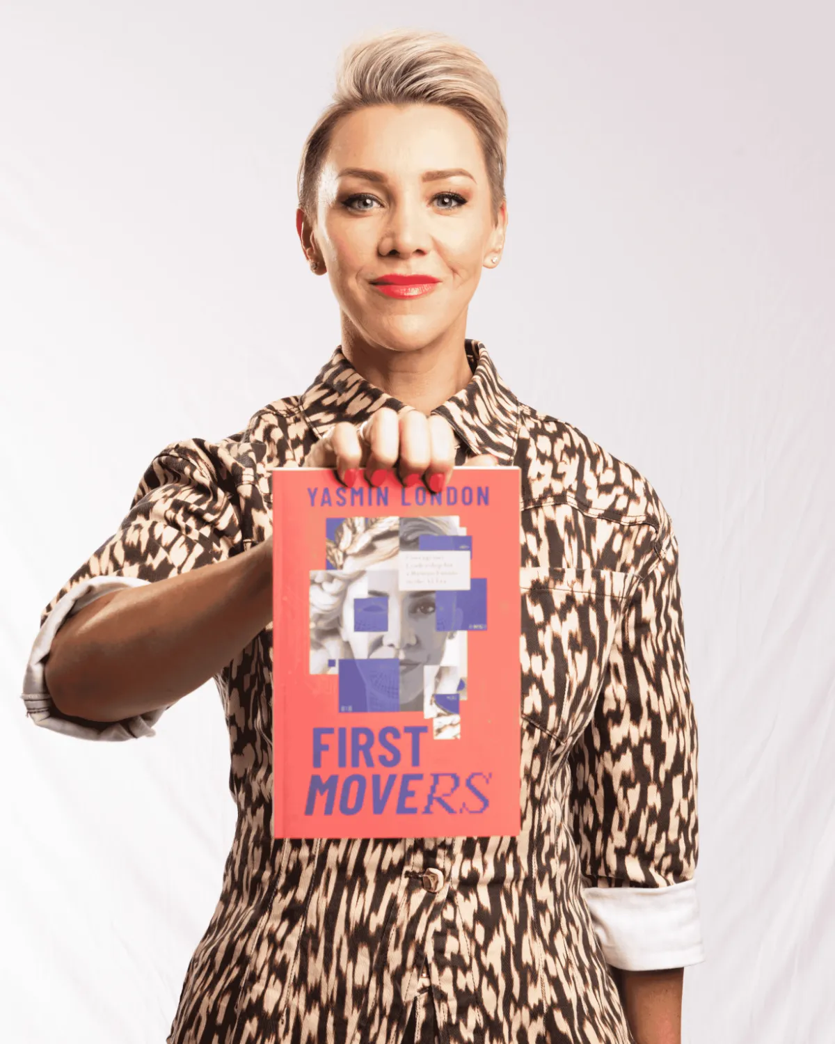 Yasmin London holding the First Movers book