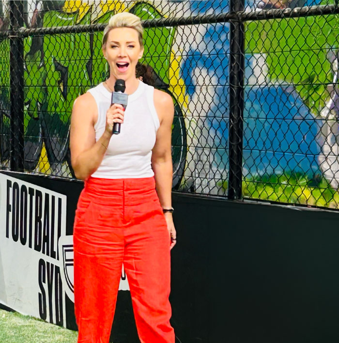 Yasmin London speaking at an outdoor event