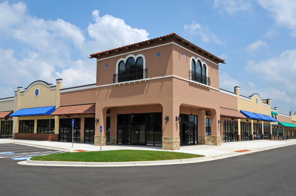 Corner shopping center retail property with multiple vacant suites ready for lease-up