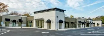 Strip center commercial property with open retail bays ideal for bridge financing during stabilization.