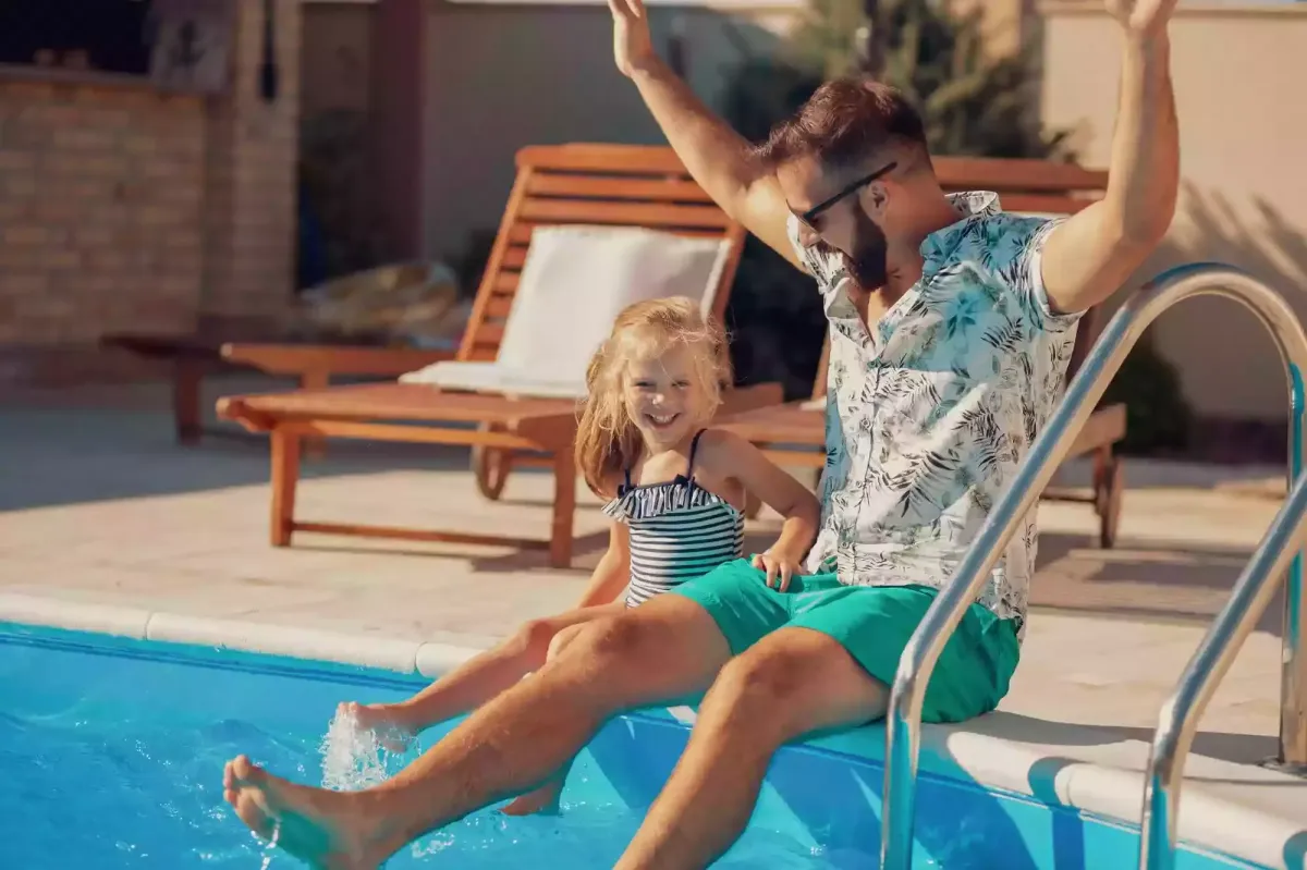 Family in pool enjoying