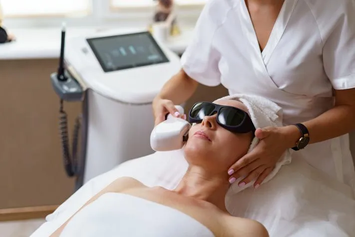 IPL skin therapy being applied by a skilled technician in Temecula, aiming to reduce age spots, sun damage, and uneven pigmentation for clearer skin.