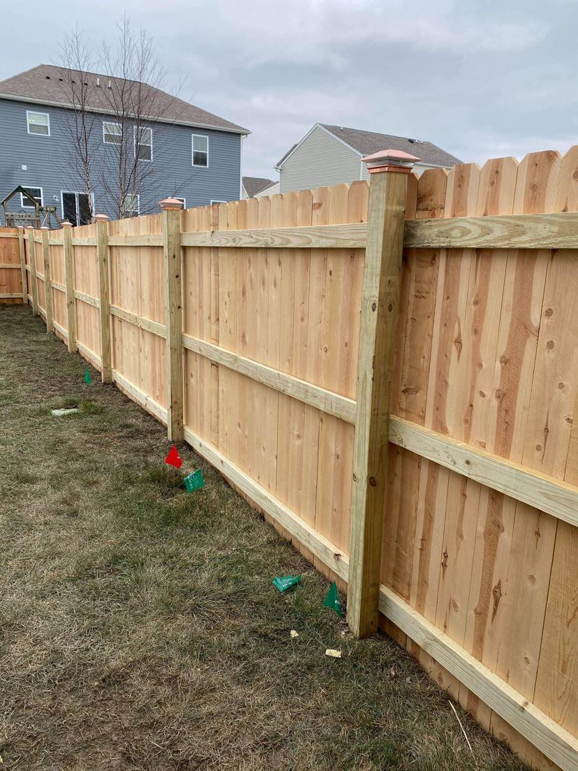 backyard fence installation residential property urbana ohio