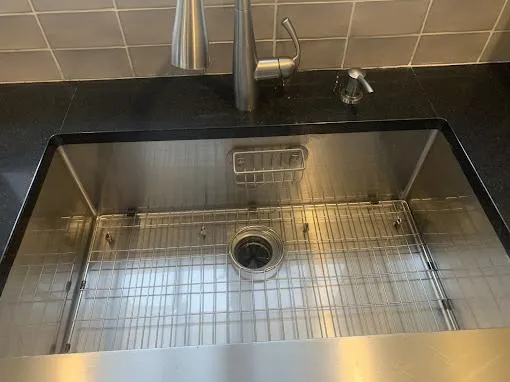 A serene, clean bedroom at a local Roanoke Rapids Airbnb.