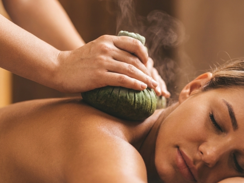 Thai herbal ball massage in Houston using hot herbal compresses for pain and stiffness relief
