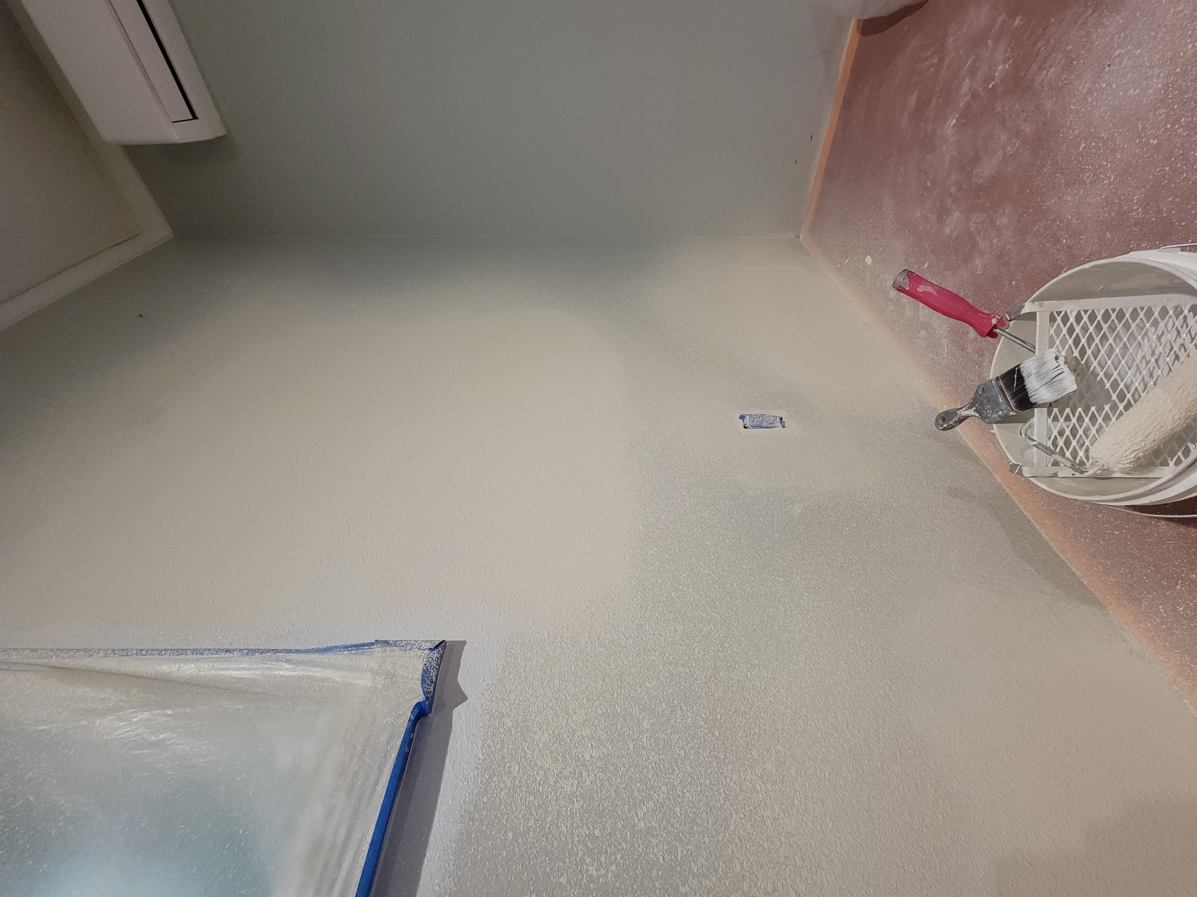 Concrete barrier painted with flowers and stars