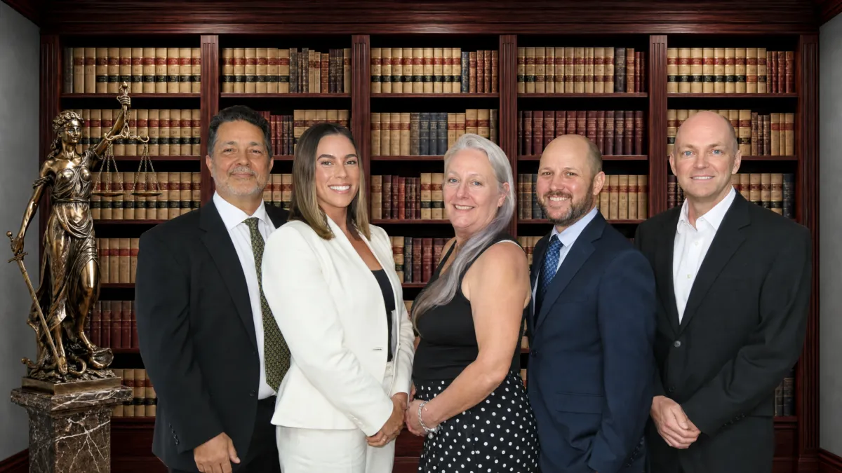 "Attorneys at Vassallo, Bilotta & Davis meeting with an injured worker in Stuart to discuss a workers’ compensation claim."