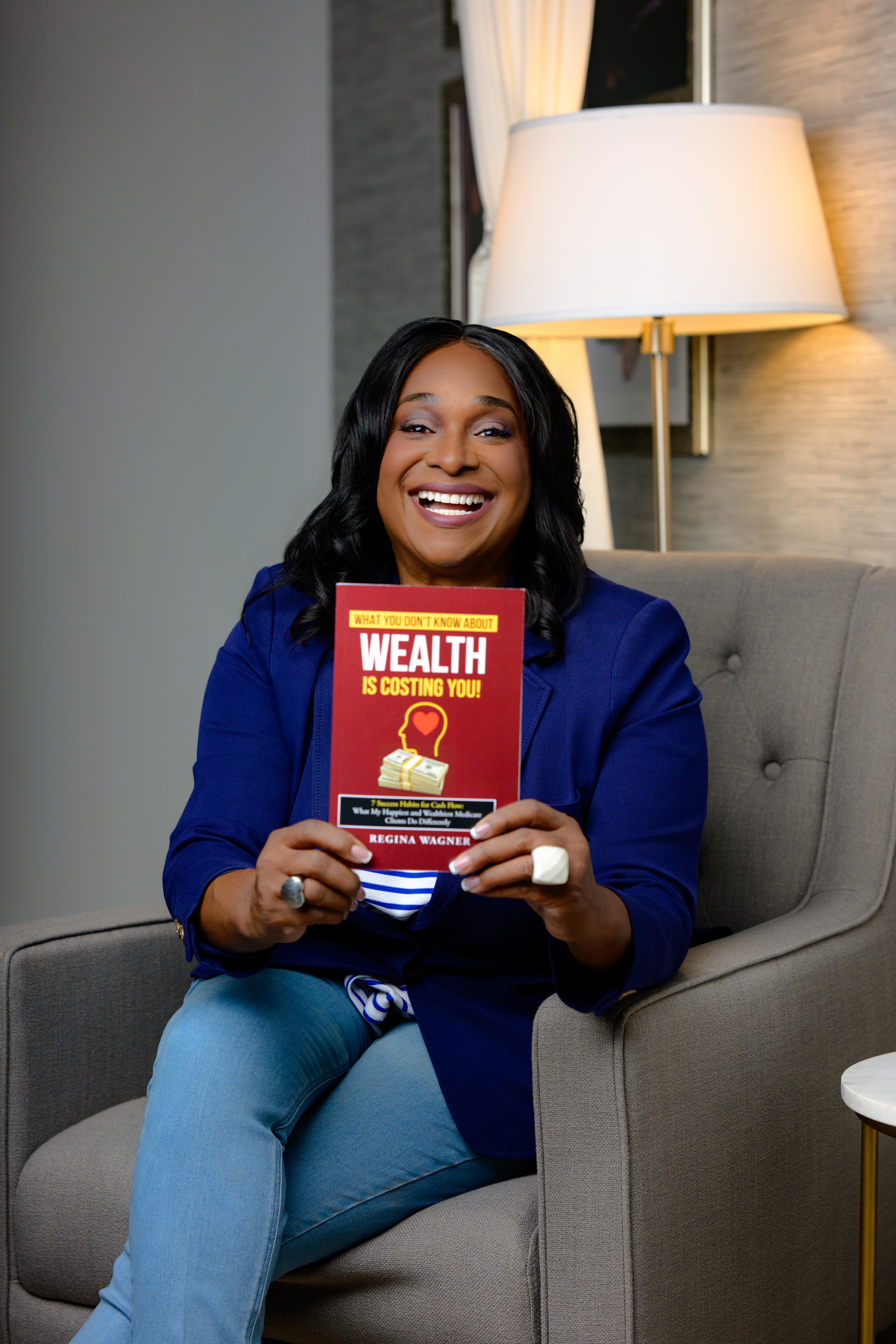 Regina Wagner and Book cover of What You Don't Know About Wealth Is Costing You by Regina Wagner - 7 Success Habits for financial freedom.