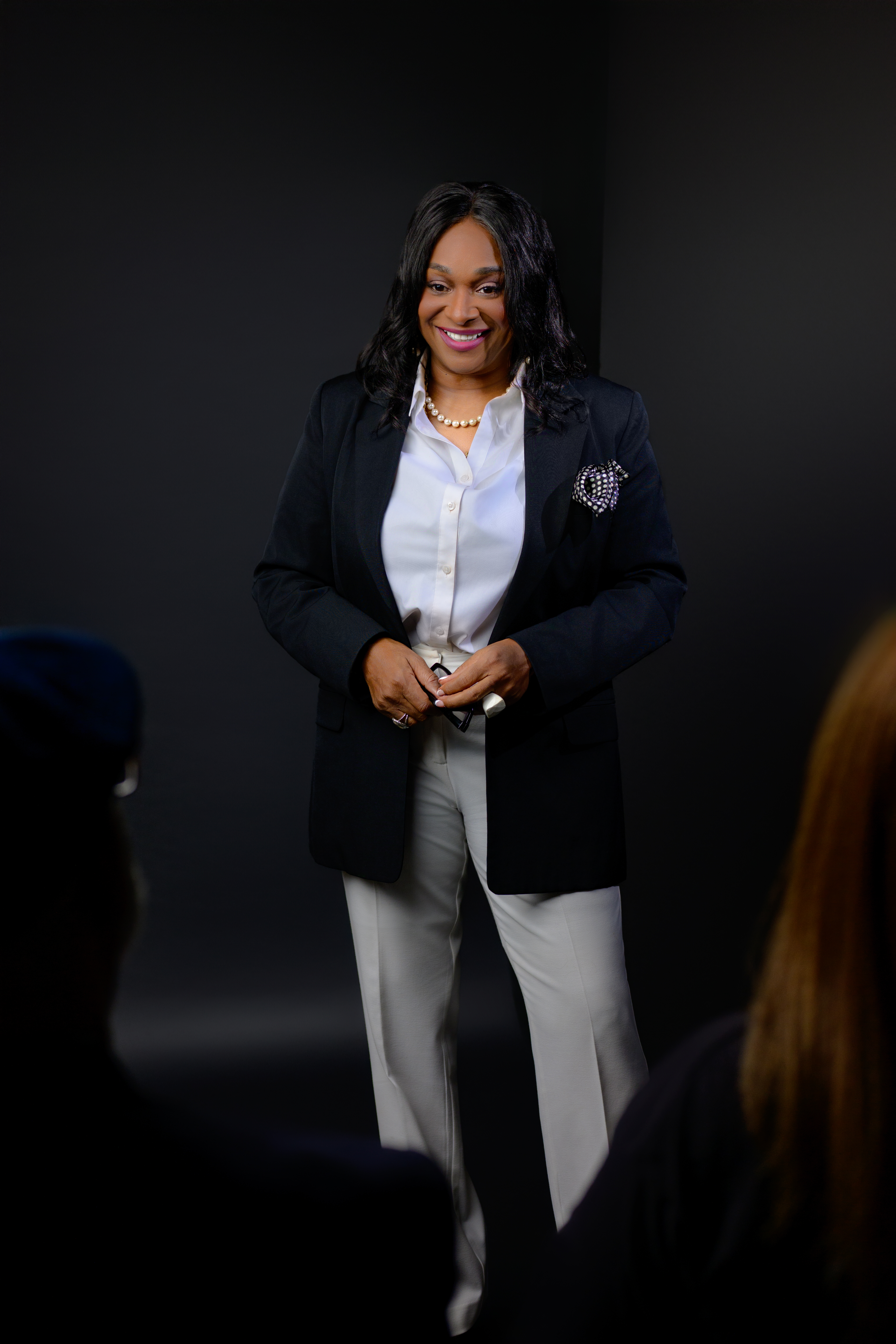 Financial advisor Regina Wagner working with clients to eliminate debt and build multiple streams of passive income.