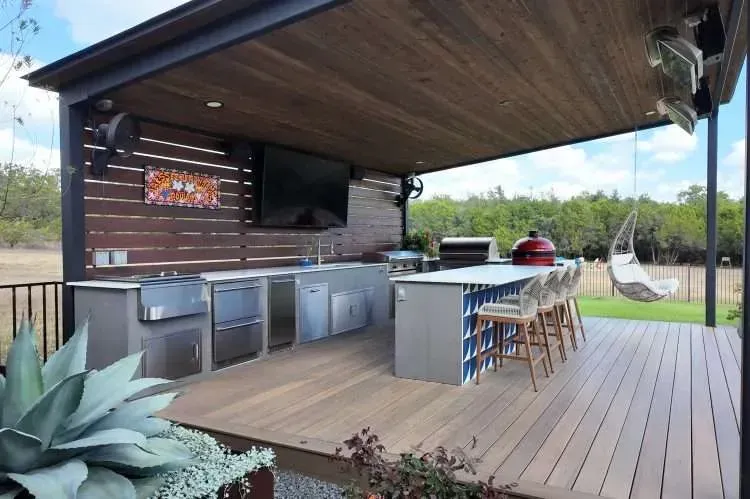 brown concrete brick on brown wooden fence
