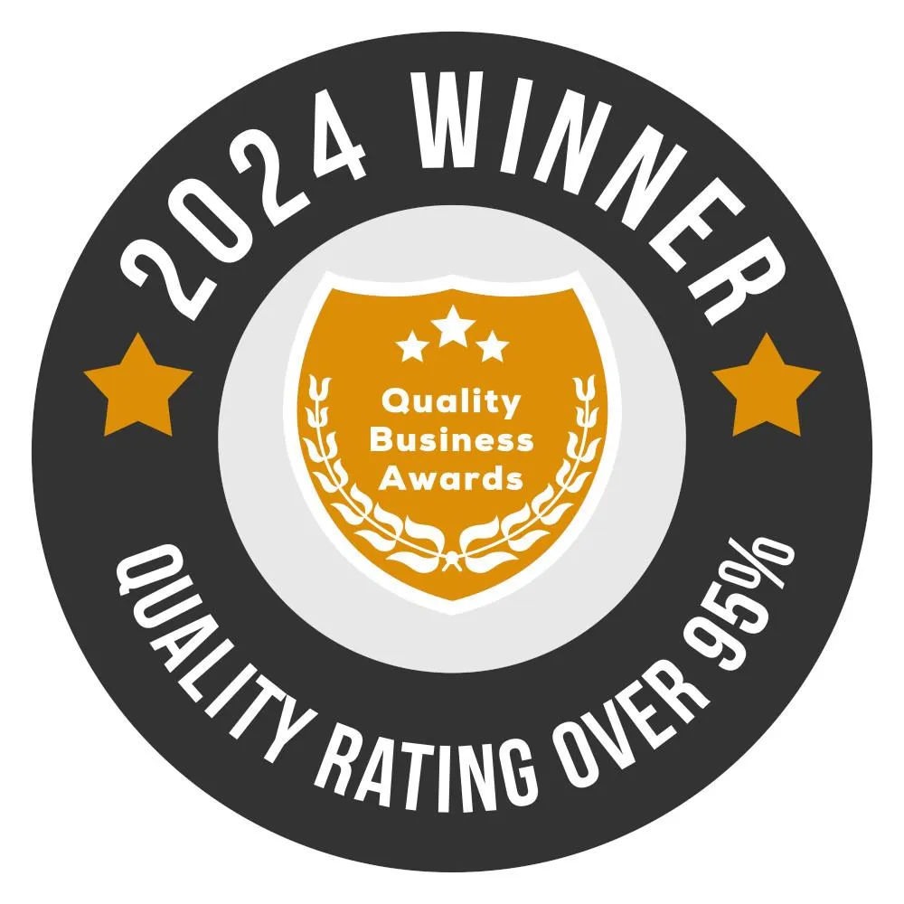 2024 Winner Quality Business Awards badge, with a gold shield emblem and the text 'Quality Rating Over 95%' in white, surrounded by a black circular border with two gold stars on either side.