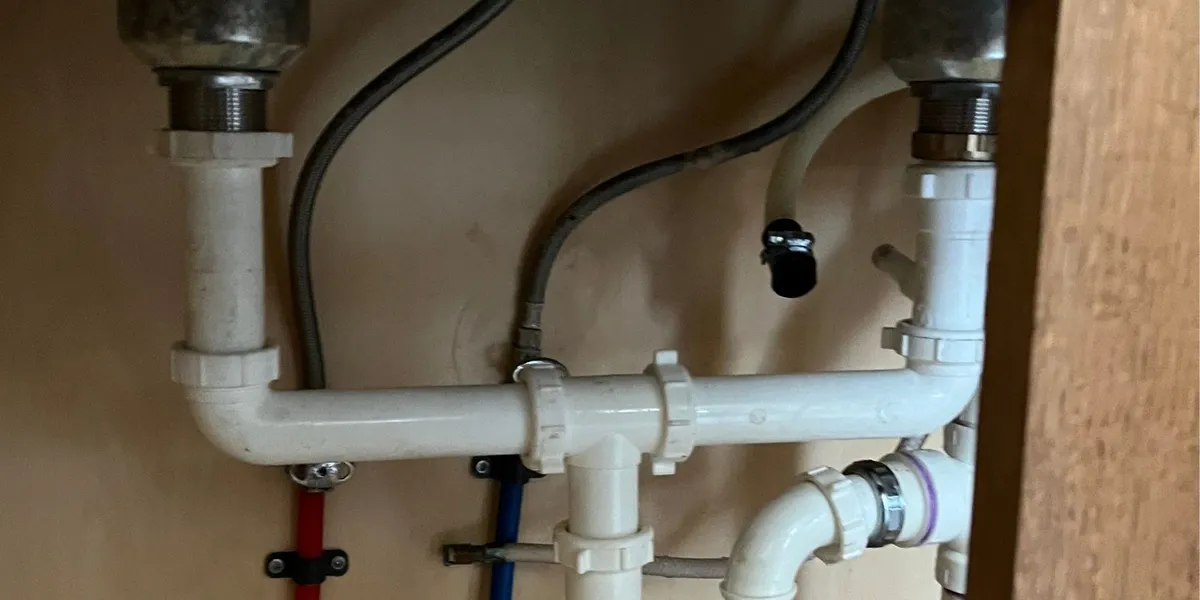 Kitchen sink plumbing pipes and drain connections