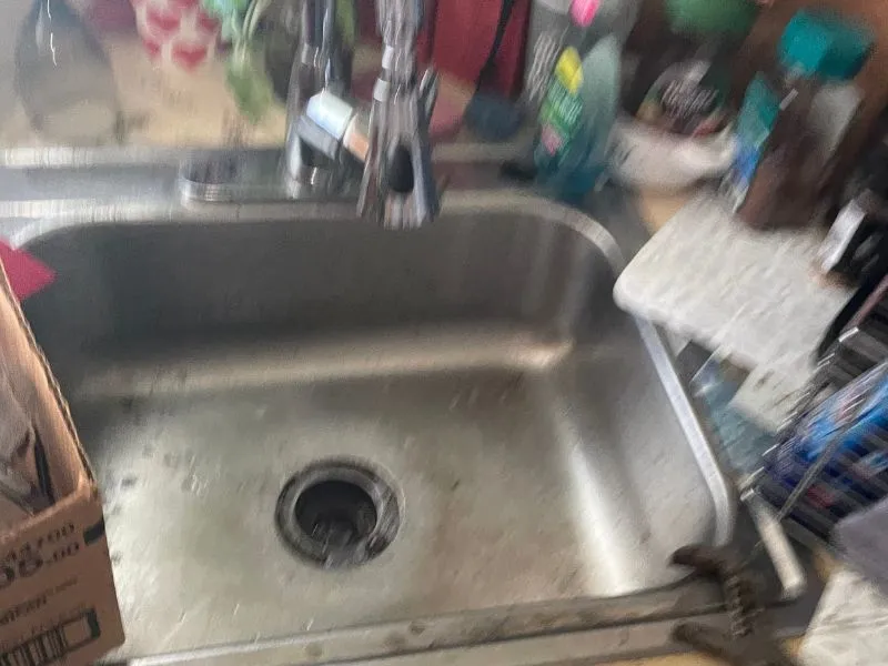 Kitchen sink after professional drain cleaning