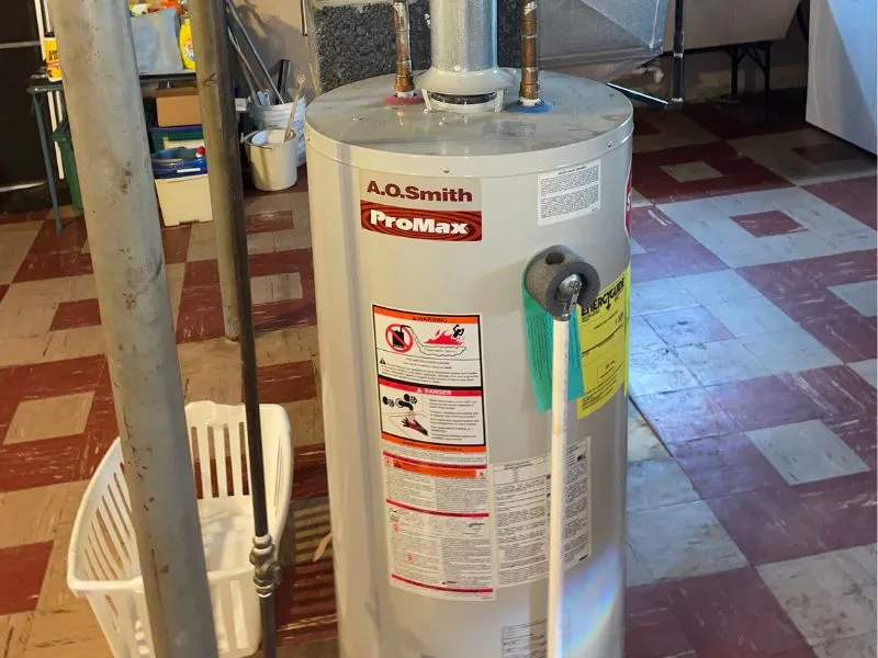 Residential A. O. Smith water heater being evaluated for repair or replacement by WorryFree Home Services in Buffalo, NY.