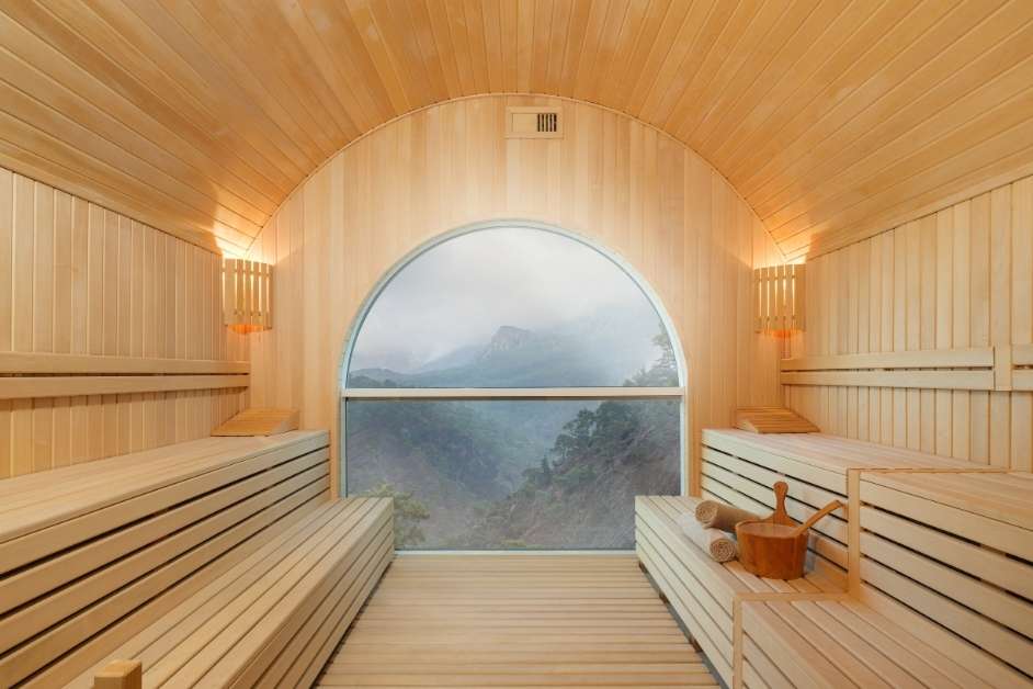 Modern custom wood sauna interior with bench seating
