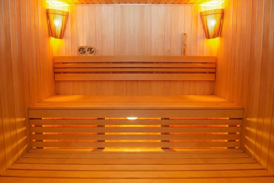 Modern indoor sauna with custom wood seating