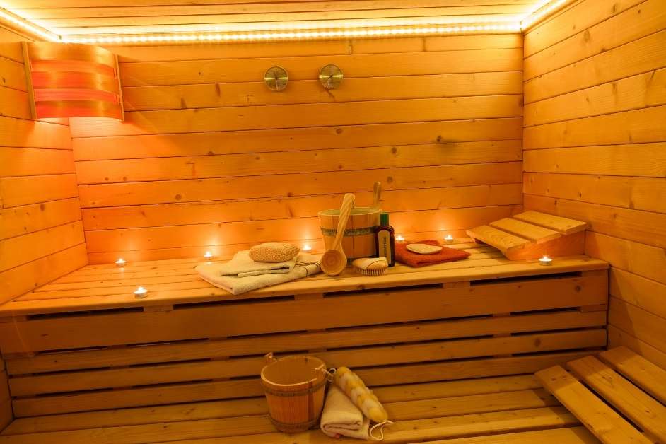 Indoor sauna bench and heater detail in a Tucson installation
