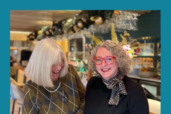 Suzanne ulph, of The Curious wolf and her client, Fiona Campbell arrand, laughing.