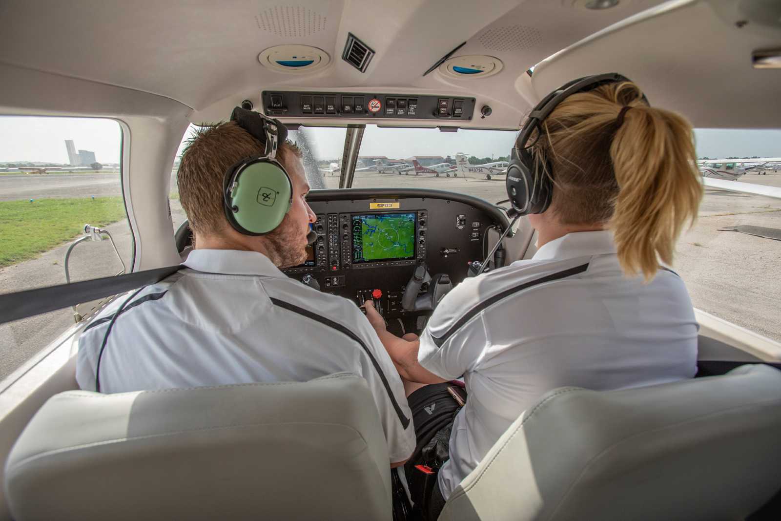 instructor and student in plane