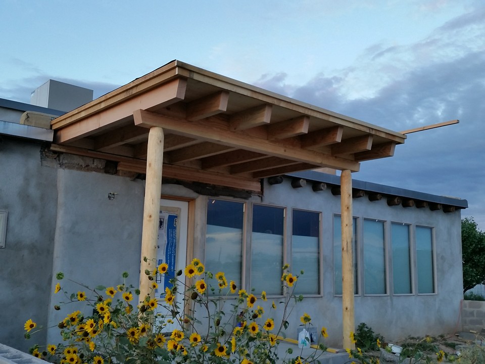 Custom wooden door and window installation by Legendary Carpentry LLC