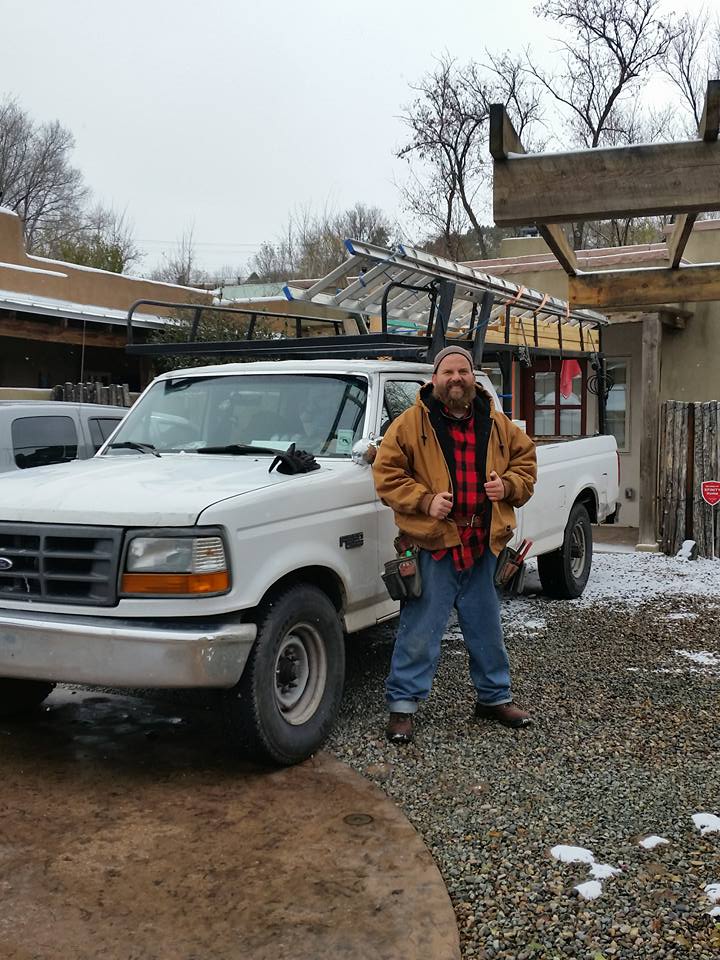 Custom wooden door and window installation by Legendary Carpentry LLC