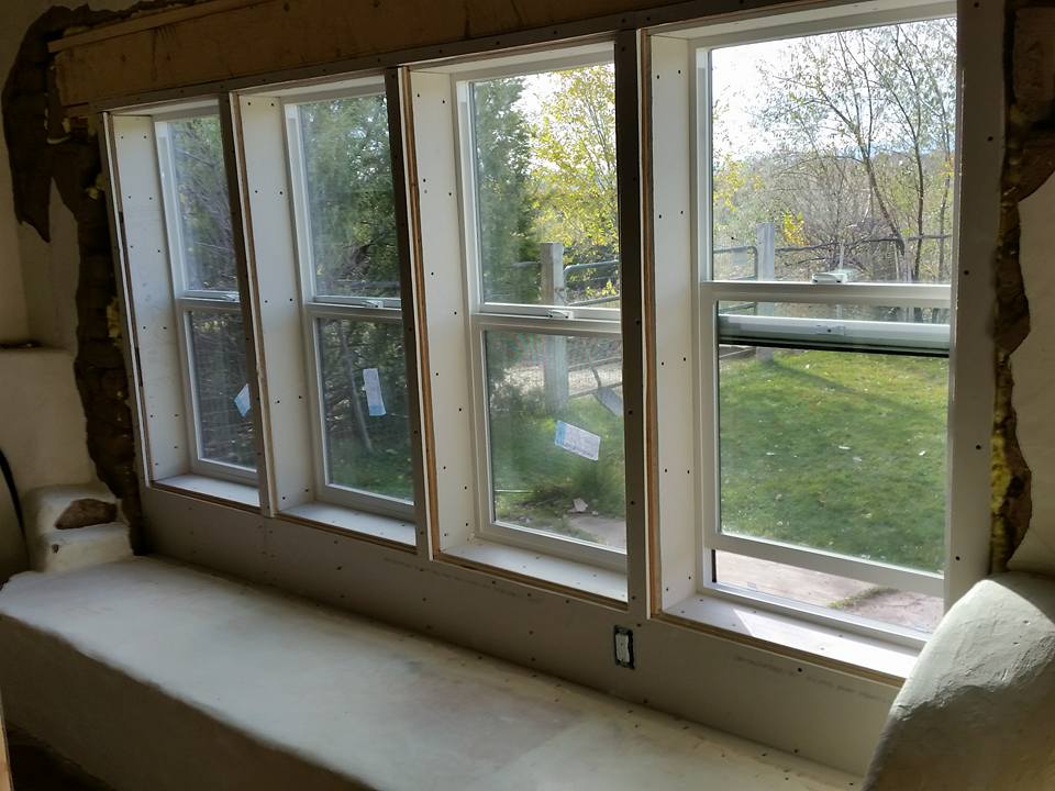 Custom wooden door and window installation by Legendary Carpentry LLC