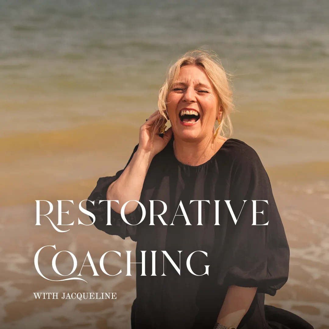 Blonde woman, Jacqueline, laughing while brushing her hair back from her face. She is wearing a black dress, overlaid across the image are the words Personal Restoration
