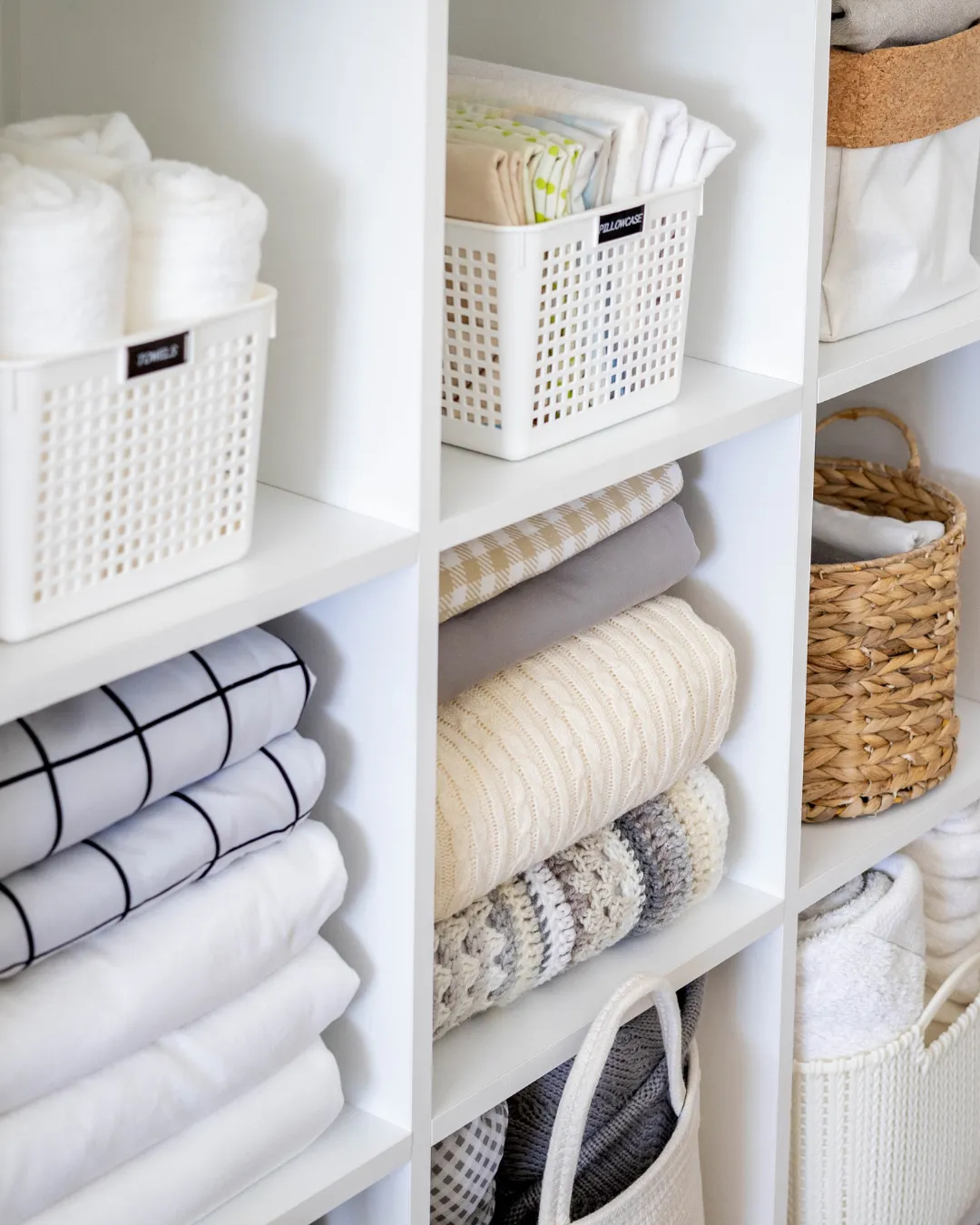 Linen closet organization Cleveland, OH - closet reset with custom labels and bins