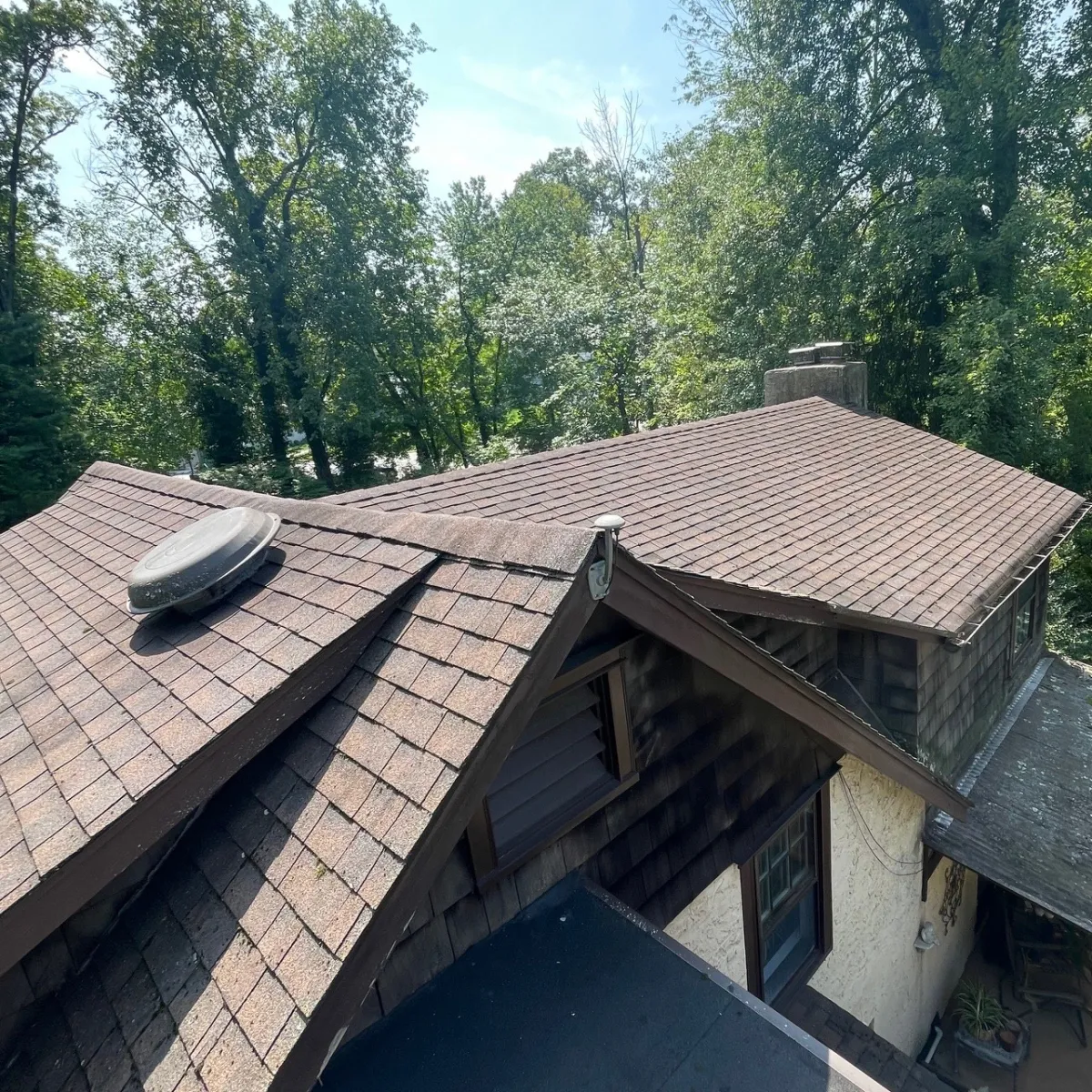 Roof maintenance in Cedar Grove, NJ (Essex County) by licensed roofing contractor New Path Roofing — completed roof inspection, cleaned gutters, and performed preventative repairs to extend roof life